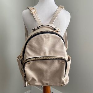 Never been used, Madison West, light beige, rounded backpack.